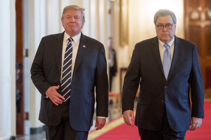 President Donald Trump and Attorney General William Barr arrive for a Public Safety Officer Medal of Valor presentation ceremony in the East Room of the White House in Washington, Wednesday, May 22, 2019.(AP Photo/Andrew Harnik)