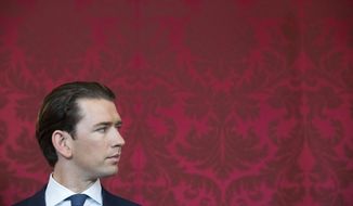 Austrian Chancellor Sebastian Kurz, attend an inauguration ceremony at Hofburg palace in Vienna, Austria, Tuesday, May 21, 2019. Austrian Chancellor Sebastian Kurz has called for an early election after the resignation of his vice chancellor Heinz-Christian Strache from the Freedom Party spelled an end to his governing coalition. (AP Photo/Michael Gruber)