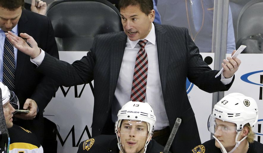 FILE - In this March 10, 2019, file photo, Boston Bruins head coach Bruce Cassidy gives instructions during the first period of an NHL hockey game against the Pittsburgh Penguins in Pittsburgh. Cassidy's Bruins will face the St. Louis Blues in Game 1 of the Stanley Cup Final on Monday, May 27, 2019, in Boston. (AP Photo/Gene J. Puskar, File)