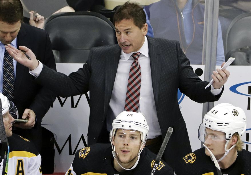 FILE - In this March 10, 2019, file photo, Boston Bruins head coach Bruce Cassidy gives instructions during the first period of an NHL hockey game against the Pittsburgh Penguins in Pittsburgh. Cassidy's Bruins will face the St. Louis Blues in Game 1 of the Stanley Cup Final on Monday, May 27, 2019, in Boston. (AP Photo/Gene J. Puskar, File)