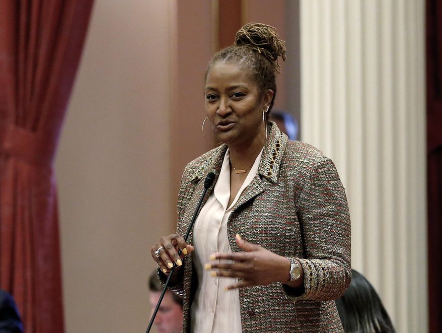 State Sen. Holly Mitchell, D-Los Angeles, chairwoman of the Senate Budget Committee, addresses the lawmakers at the Capitol Wednesday, May 22, 2019, in Sacramento, Calif. The Senate Budget Committee approved a $214 billion spending plan on Wednesday that would make more immigrants living in the country illegally eligible for government assistance Wednesday. (AP Photo/Rich Pedroncelli)