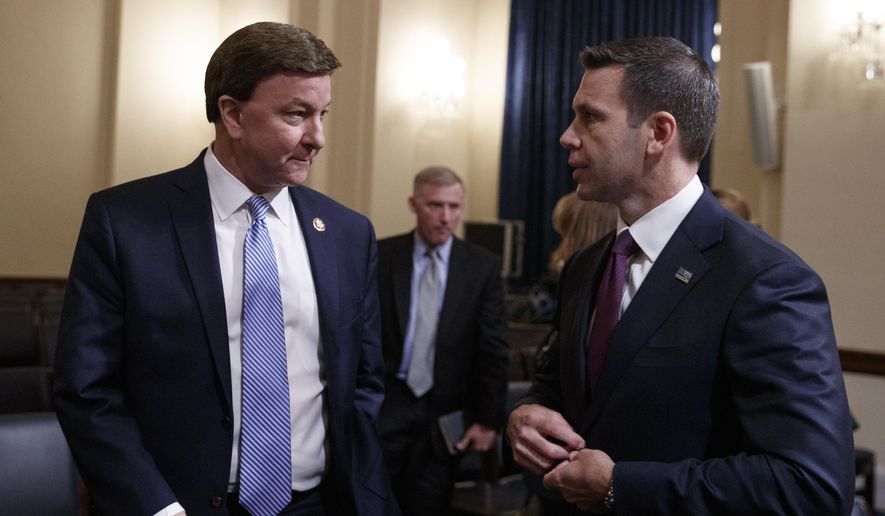House Homeland Security Committee ranking member Rep. Mike Rogers, R-Ala., left, speaks with acting Secretary of Homeland Security Kevin McAleenan on Capitol Hill in Washington, Wednesday, May 22, 2019, at the conclusion of the House Homeland Security Committee on budget. (AP Photo/Carolyn Kaster) ** FILE **