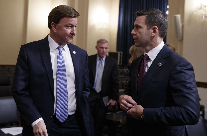 House Homeland Security Committee ranking member Rep. Mike Rogers, R-Ala., left, speaks with acting Secretary of Homeland Security Kevin McAleenan on Capitol Hill in Washington, Wednesday, May 22, 2019, at the conclusion of the House Homeland Security Committee on budget. (AP Photo/Carolyn Kaster) ** FILE **