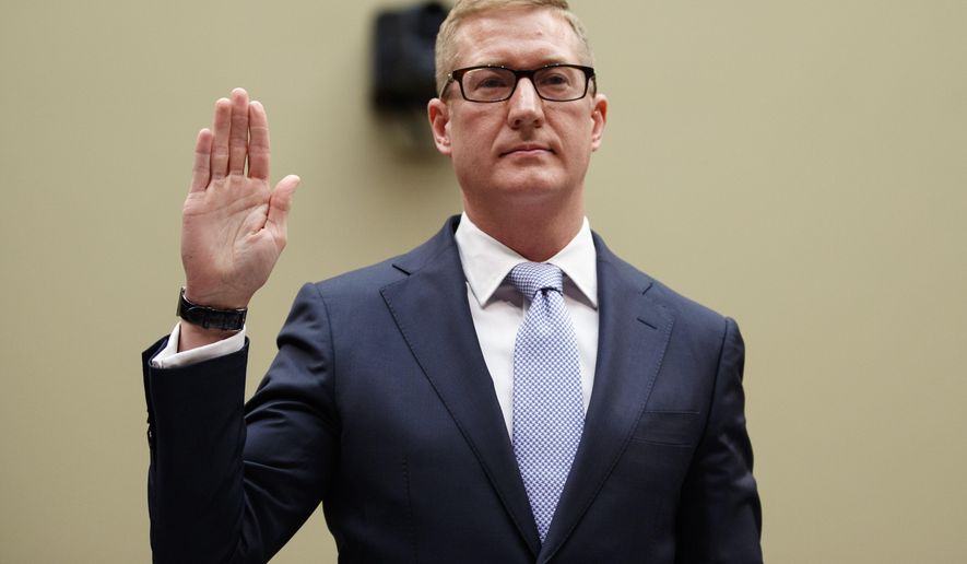 Deputy Assistant Attorney General for National Security Adam Hickey, is sworn in to testify on Capitol Hill in Washington, Wednesday, May 22, 2019, before the House Oversight and Reform National Security subcommittee hearing on "Securing U.S. Election Infrastructure and Protecting Political Discourse." (AP Photo/Carolyn Kaster)