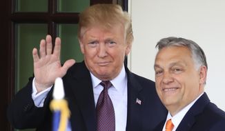 In this Monday, May 13, 2019, photo, U.S. President Donald Trump welcomes Hungary Prime Minister Viktor Orban to the White House in Washington. (AP Photo/Manuel Balce Ceneta) **FILE**