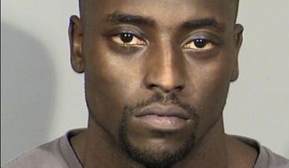 FILE - This undated Clark County Detention Center photo released by the Las Vegas Metropolitan Police Department shows Cierre Wood. Wood, a former NFL player, was arrested April 10, 2019, in Las Vegas and is charged with murder and felony child abuse in the death of La&#x27;Rayah Davis, the 5-year-old daughter of his girlfriend, Amy Taylor. Wood was ordered Wednesday, May 22,2019 to stand trial in state court on murder and 19 felony child abuse and neglect charges in the death of his girlfriend&#x27;s 5-year-old daughter less than two weeks after they moved into his Las Vegas apartment. (Las Vegas Metropolitan Police Department via AP, File)
