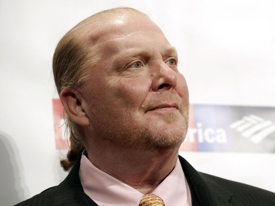 FILE - In this Wednesday, April 19, 2017, file photo, chef Mario Batali attends an awards event in New York. The Suffolk County District Attorney’s Office in Boston says Batali is scheduled to be arraigned Friday, May 24, 2019, on a charge of indecent assault and battery, in connection with an allegation that he forcibly kissed and groped a woman at a Boston restaurant in 2017. (Photo by Brent N. Clarke/Invision/AP, File)