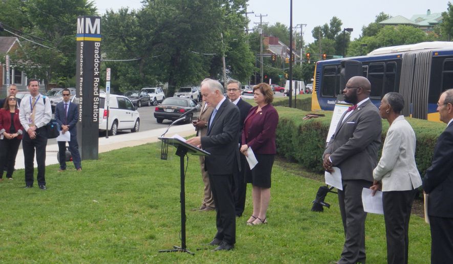 Metro General Manager Paul Wiedefeld and regional transportation officials talked about plans for the subway system Wednesday at the Braddock Road Metro Station, one of six stations that will close this summer for platform construction. (Orrin Konheim/Special to The Washington Times) 