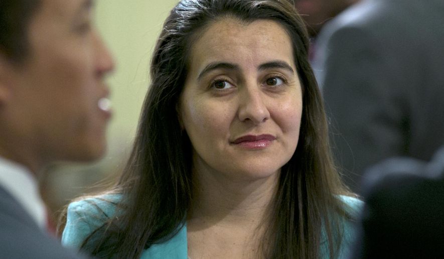 FILE - In this July 20, 2017, file photo, Assemblywoman Monique Limon, D-Goleta, at the Capitol, in Sacramento, Calif. The California Assembly voted Thursday, May 23, 2019, to cap the interest lenders may charge on loans that can currently carry rates spiraling into the triple digits. Limon of Santa Barbara, the bill's author, also suggested that an interest rate cap could end up on the ballot if the Legislature does not act. (AP Photo/Rich Pedroncelli, File)