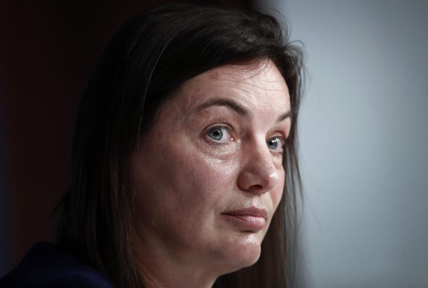 FILE - In this Wednesday, Feb. 20, 2019 file photo, France women's soccer head coach Corinne Diacre during a press conference in Paris. With an experienced side featuring seven players from the Lyon side which recently won the Champions League for the fourth straight year, host France will be among the favorites for the Women's World Cup, and this suits coach Corinne Diacre just fine. (AP Photo/Christophe Ena, File)