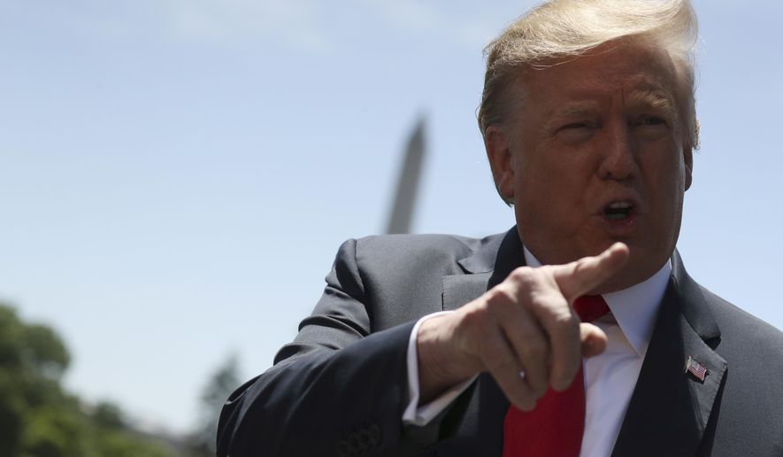 President Donald Trump speaks to members of the media on the South Lawn of the White House in Washington, Friday, May 24, 2019, before boarding Marine One for a short trip to Andrews Air Force Base, Md, and then on to Tokyo. (AP Photo/Andrew Harnik)