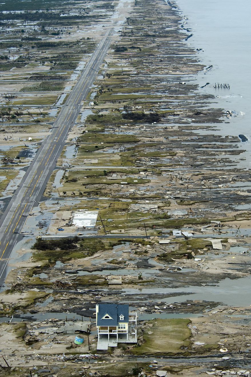 In this Sunday, Sept. 14, 2008 photo, a single house is left standing amidst the devastation left by Hurricane Ike, in Gilchrist, Texas. ( Smiley N. Pool/Houston Chronicle via AP)