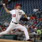 Washington Nationals pitcher Erick Fedde (23) winds up a pitch in the second inning of a baseball game against the Miami Marlins Sunday, May 26, 2019, in Washington. (AP Photo/Jacquelyn Martin) ** FILE **