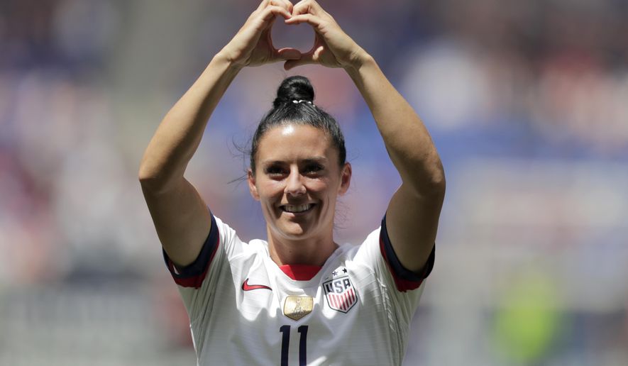 Ali Krieger, a defender for the United States women&#39;s national team which is headed to the FIFA Women&#39;s World Cup, is introduced to fans during a send-off ceremony following an international friendly soccer match against Mexico, Sunday, May 26, 2019, in Harrison, N.J. (AP Photo/Julio Cortez)