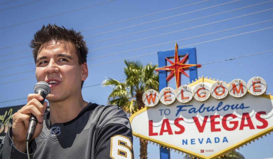 "Jeopardy!" sensation James Holzhauer speaks after being presented with a key to the Las Vegas Strip in front of the Welcome to Fabulous Las Vegas sign in Las Vegas.  (Caroline Brehman/Las Vegas Review-Journal via AP, File)