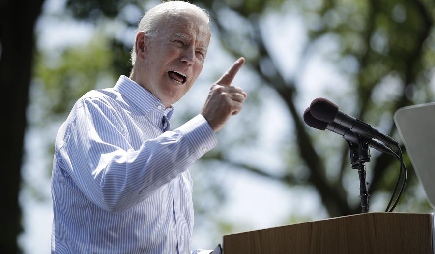 FILE - In this May 18, 2019, file photo, Democratic presidential candidate, former Vice President Joe Biden speaks during a campaign rally at Eakins Oval in Philadelphia. Rising disagreement among congressional Democrats over whether to pursue impeachment of President Donald Trump has had little effect on the party’s presidential candidates, who mostly are avoiding calls to start such an inquiry. (AP Photo/Matt Rourke, File)