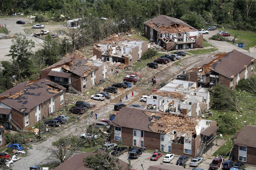 FILE - In this May 23, 2019 file. Photo, tornado damage is seen in Jefferson City, Mo. Eight years to the day after a devastating tornado killed 161 people in Joplin, another big twister ripped through another Missouri community, Jefferson City, but with a far different result: No deaths, no serious injuries. The two storms share a May 22 date, the same state, and both happened in towns of similar size. Both tornadoes ravaged residential areas and business districts. (AP Photo/Jeff Roberson, File)