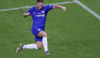 Chelsea&#39;s Eden Hazard celebrates after scoring his team&#39;s fourth goal during the Europa League Final soccer match between Chelsea and Arsenal at the Olympic stadium in Baku, Azerbaijan, Wednesday, May 29, 2019. (AP Photo/Dmitri Lovetsky)