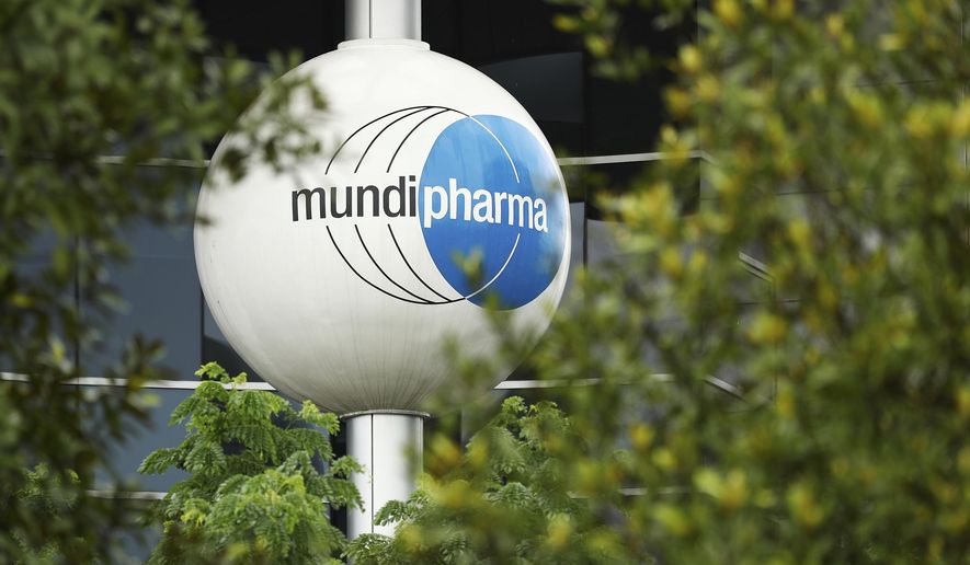 This Thursday, May 16, 2019, photo shows the exterior of a Mundipharma building in Singapore. As the United States fights to undo the damage of an opioid epidemic, Mundipharma and other companies are expanding around the world. The Mundipharma network of companies now operates in more than 120 countries; an emerging markets branch has expanded into Asia, Africa and Latin America, selling an assortment of drugs that include opioids for chronic pain. (AP Photo/Yong Teck Lim)