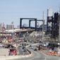 FILE - This April 17, 2019, file photo general view of the construction site of the new Route 7 drawbridge in Kearny, N.J. Small businesses want the federal government to follow through on promises of $2 trillion to rebuild the nation’s infrastructure. (AP Photo/Julio Cortez, File)