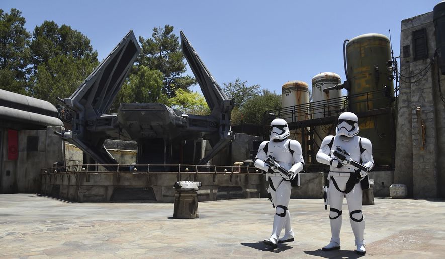 Stormtroopers patrol the Tie Echelon Stage during the Star Wars: Galaxy's Edge Media Preview at Disneyland Park, Wednesday, May 29, 2019, in Anaheim, Calif. (Photo by Chris Pizzello/Invision/AP)