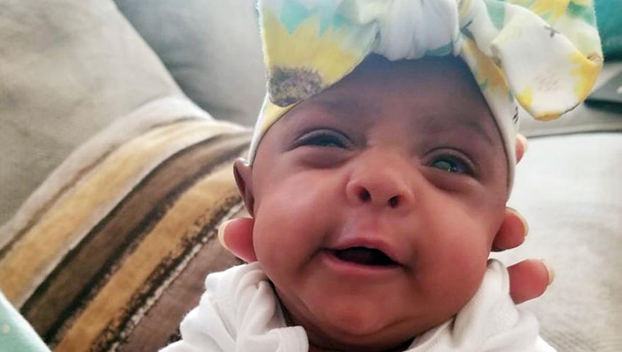 his Tuesday, May 28, 2019, photo provided by Sharp HealthCare in San Diego shows a baby named Saybie. Sharp Mary Birch Hospital for Women & Newborns said in a statement Wednesday, May 29, 2019, that Saybie, born at 23 weeks and three days, is believed to be the world's tiniest surviving baby, who weighed just 245 grams (about 8.6 ounces) before she was discharged as a healthy infant. She was sent home this month weighing 5 pounds (2 kilograms) after nearly five months in the hospital's neonatal intensive care unit. (Sharp HealthCare via AP)