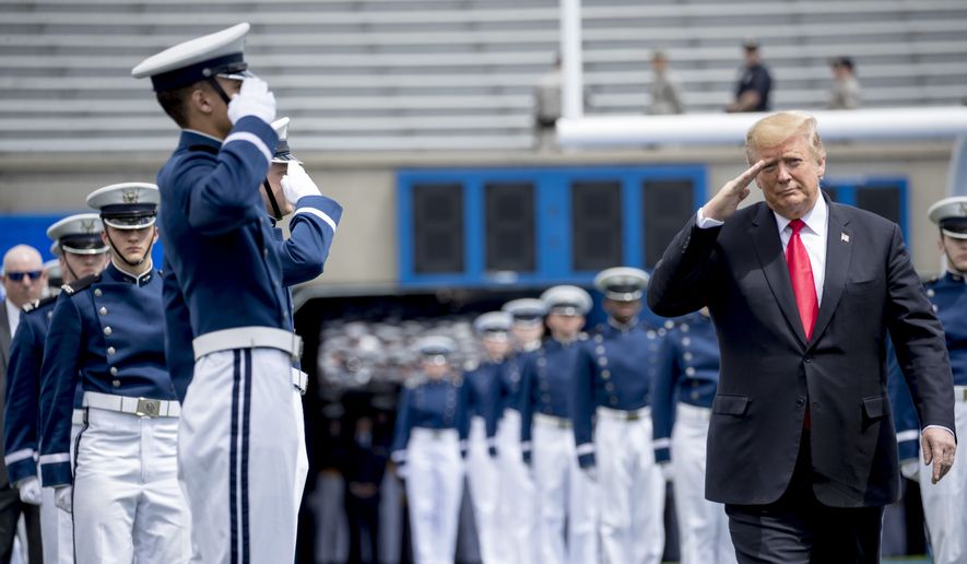 President Donald Trump arrives at the 2019 United States Air Force Academy Graduation Ceremony at Falcon Stadium, Thursday, May 30, 2019, at the United States Air Force Academy, in Colorado Springs, Colo. (AP Photo/Andrew Harnik)