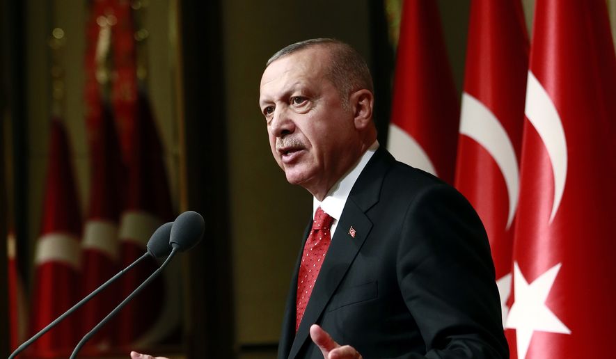 Turkey&#x27;s President Recep Tayyip Erdogan gestures as he addresses a meeting in Ankara, Turkey, Thursday, May 30, 2019. Erdogan and U.S. President Donald Trump will meet at next month&#x27;s Group of 20 summit to discuss bilateral issues, including Ankara&#x27;s plan to buy a Russian missile defense system that has raised the ire of the United States. (Presidential Press Service via AP, Pool)