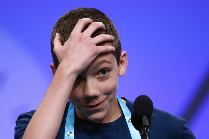 Sebastian Castilla, 13, of Cincinnati, competes in the finals of the Scripps National Spelling Bee, Thursday, May 30, 2019, in Oxon Hill, Md. (AP Photo/Patrick Semansky)