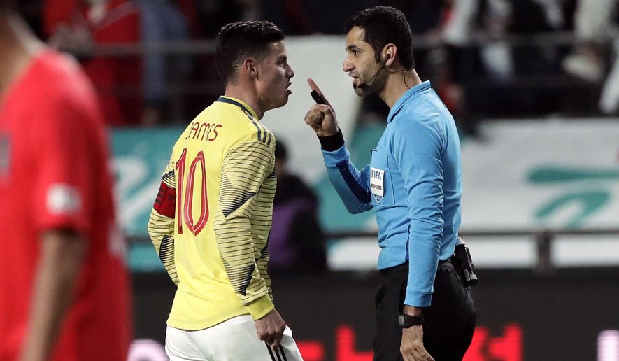 FILE - In this March 26, 2019, file photo, Colombia&#x27;s James Rodriguez argues with referee Abdulrahman Al Jassim during a friendly soccer match between South Korea and Colombia at Seoul World Cup Stadium in Seoul, South Korea. Abdulrahman Al Jassim, from Qatar which is the host of the 2022 World Cup, was selected as one of the 16 referees for this year&#x27;s CONCACAF Gold Cup. (AP Photo/Lee Jin-man, File)