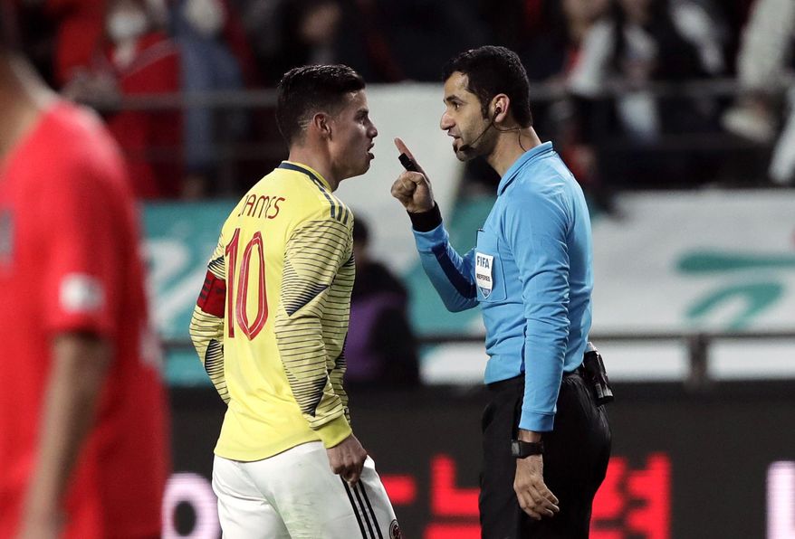FILE - In this March 26, 2019, file photo, Colombia&#39;s James Rodriguez argues with referee Abdulrahman Al Jassim during a friendly soccer match between South Korea and Colombia at Seoul World Cup Stadium in Seoul, South Korea. Abdulrahman Al Jassim, from Qatar which is the host of the 2022 World Cup, was selected as one of the 16 referees for this year&#39;s CONCACAF Gold Cup. (AP Photo/Lee Jin-man, File)