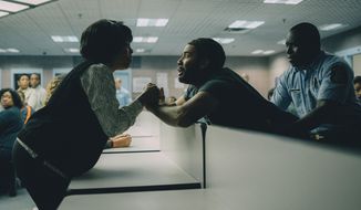 This image released by Netflix shows Niecy Nash as Delores Wise, left, and Jharrel Jerome as Korey Wise in a scene from &amp;quot;When They See Us.&amp;quot; (Atsushi Nishijima/Netflix via AP)