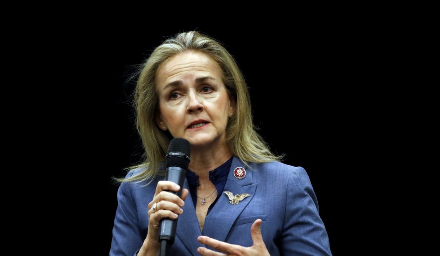 In this May 24, 2019, file photo, Rep. Madeleine Dean, D-Pa., speaks during a panel discussion at Delaware County Community College in Media, Pa. In suburban Philadelphia, it took a little over eight minutes into the question-and-answer portion of freshman Dean’s town hall for someone to ask about impeachment. (AP Photo/Matt Slocum, File) ** FILE **