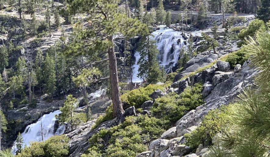 This Friday, May 31, 2019, photo released by the North Tahoe Fire Protection District shows the Eagle Falls at Emerald Bay State Park in South Lake Tahoe, Calif. Firefighters say a woman died Friday, while taking photos at a Northern California waterfall. Investigators believe she lost her footing and slipped. The district says in a statement that the tragedy "is a sad reminder to be cautious when taking selfies and other photos in dangerous areas." (Erin Holland/North Tahoe Fire Protection District via AP)