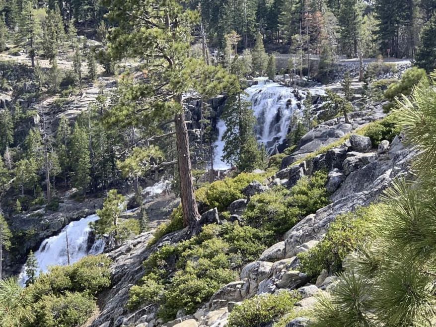 This Friday, May 31, 2019, photo released by the North Tahoe Fire Protection District shows the Eagle Falls at Emerald Bay State Park in South Lake Tahoe, Calif. Firefighters say a woman died Friday, while taking photos at a Northern California waterfall. Investigators believe she lost her footing and slipped. The district says in a statement that the tragedy "is a sad reminder to be cautious when taking selfies and other photos in dangerous areas." (Erin Holland/North Tahoe Fire Protection District via AP)