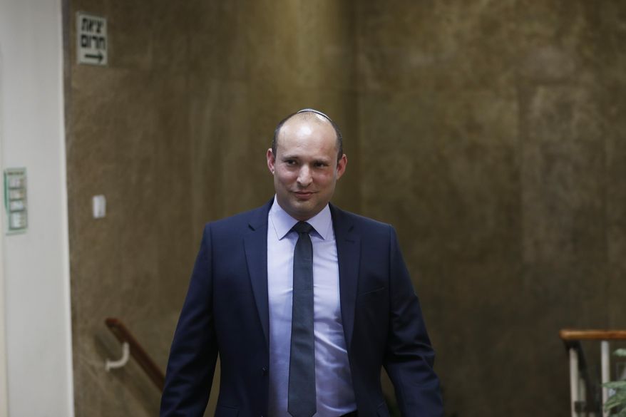 Israeli Education Minister Naftali Bennett arrives to attend the weekly Cabinet meeting in Jerusalem Sunday, June 2, 2019. Prime Minister Benjamin Netanyahu has fired his education and justice ministers, days after parliament voted to hold new elections. An official in Netanyahu’s office confirmed that Naftali Bennett and Ayelet Shaked, two hawkish former allies, were dismissed from the interim government. (Ronen Zvulun, Pool via AP)
