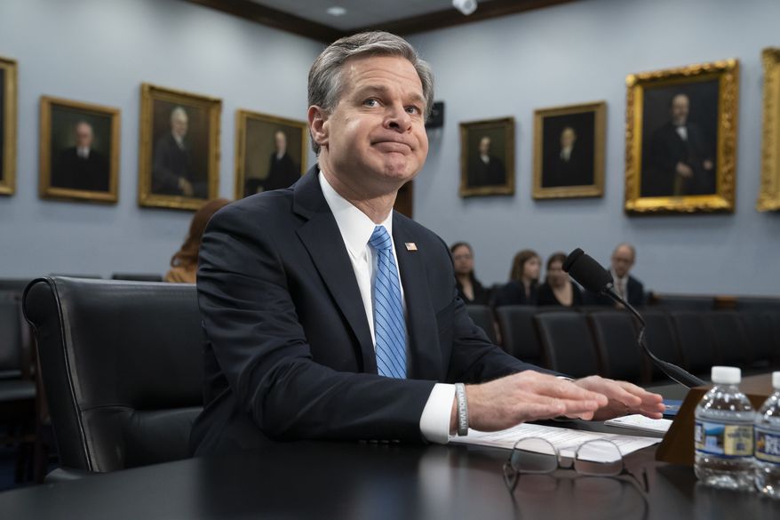 FBI Director Christopher Wray arrives to deliver his budget request to a House Appropriations subcommittee, on Capitol Hill in Washington, Thursday, April 4, 2019. (AP Photo/J. Scott Applewhite)