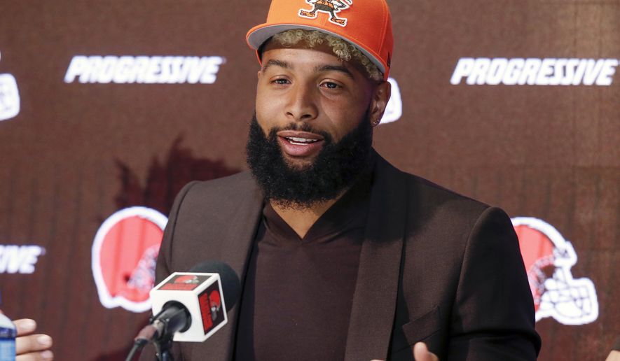 FILE- In this April 1, 2019, file photo, Cleveland Browns' Odell Beckham answers questions during a news conference in Berea, Ohio. Beckham reported for Cleveland’s mandatory minicamp and will practice Tuesday, June 4, 2019, after missing most of the team’s voluntary workouts. The star wide receiver has been away from the team and training in California. (AP Photo/Ron Schwane, File)