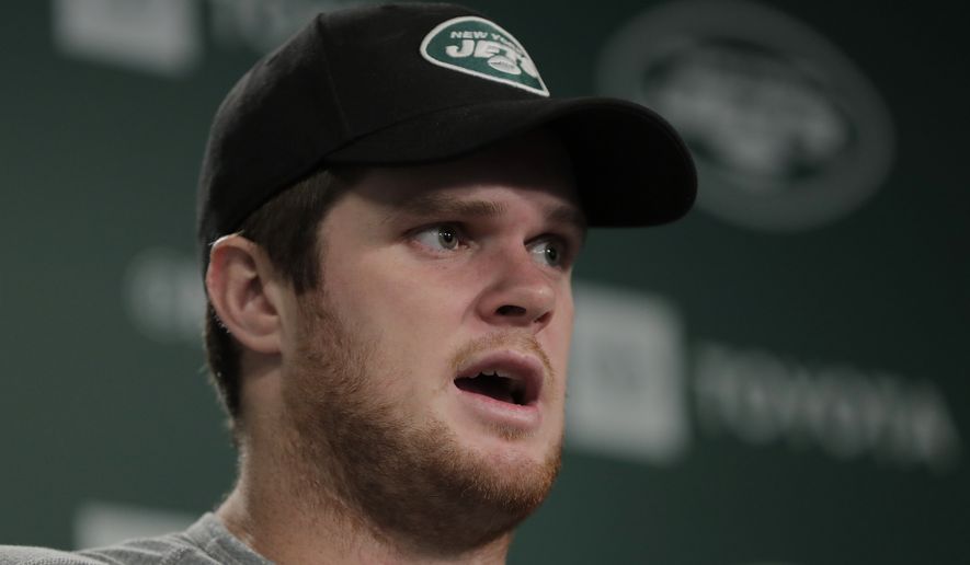 New York Jets quarterback Sam Darnold speaks to reporters at the team's NFL football training facility in Florham Park, N.J., Tuesday, June 4, 2019. (AP Photo/Julio Cortez)