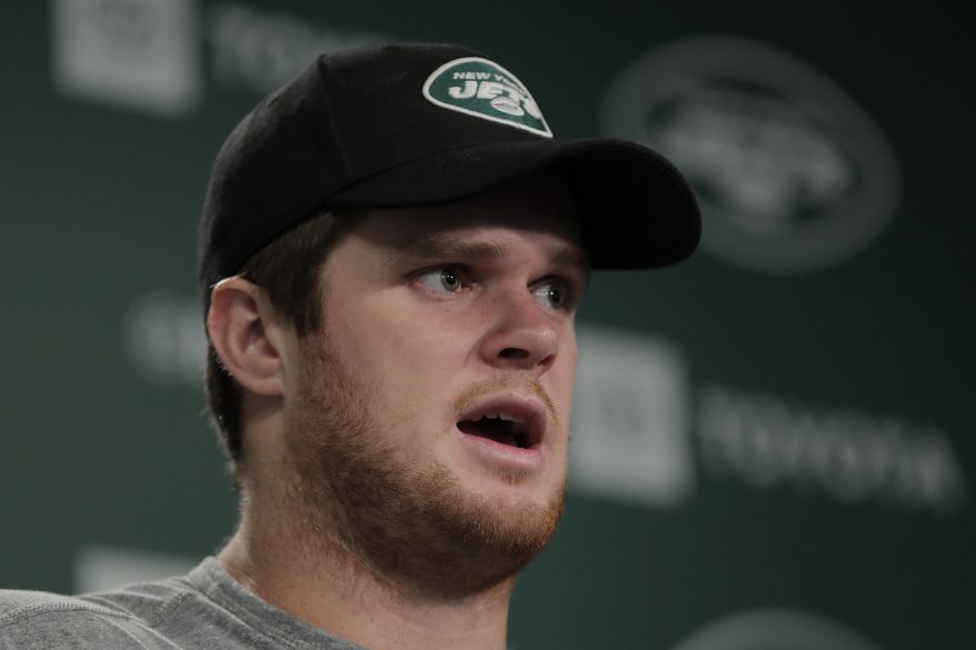 New York Jets quarterback Sam Darnold speaks to reporters at the team's NFL football training facility in Florham Park, N.J., Tuesday, June 4, 2019. (AP Photo/Julio Cortez)