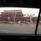 The large portrait of former Chinese leader Mao Zedong on Tiananmen Gate next to Tiananmen Square is seen through the window of car in Beijing, Tuesday, June 4, 2019. Chinese authorities stepped up security Tuesday around Tiananmen Square in central Beijing, a reminder of the government&#39;s attempts to quash any memories of a bloody crackdown on pro-democracy protests 30 years ago. (AP Photo/Mark Schiefelbein)