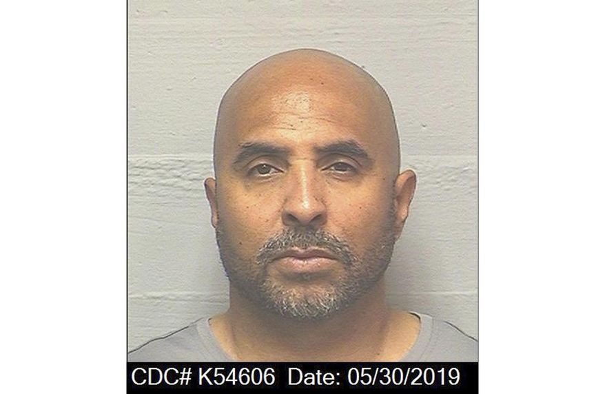 This May 30, 2019, photo released by the California Department of Corrections and Rehabilitation shows Kenneth Oliver. The California man, has been freed from prison after serving 23 years of his life sentence on a joyriding conviction. It included eight years in solitary confinement for possessing a book written by the co-founder of a notorious prison gang. (California Department of Corrections and Rehabilitation via AP)