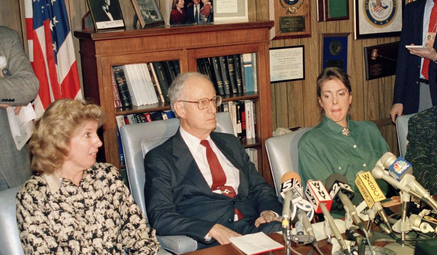 FILE- In this March 26, 1988 file photo, prosecutor Linda Fairstein, left, is shown during a news conference in New York. Fairstein was the top Manhattan sex crimes prosecutor when five teenagers were wrongly charged with the 1989 rape and beating of a woman jogging in New York&#39;s Central Park. Since the release of the Netflix series &amp;quot;When They See Us,&amp;quot; a miniseries that dramatizes the events surrounding the trial, she has resigned from at least two nonprofit boards as backlash from the case intensified. Seated at the table from left are Fairstein, District Attorney Robert Morgenthau, and Ellen Levin, whose daughter Jennifer Levin was murdered in 1986. (AP Photo/Charles Wenzelberg, File)