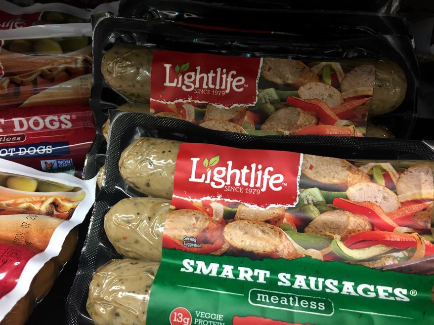 In this Sept. 1, 2018, photo Lightlife Smart Sausages are displayed at a store in Jersey City, N.J. Louisiana lawmakers agreed Tuesday, June 4, 2019, to labeling restrictions that will keep veggie products from being called meat, non-rice products from being described as rice and sugar alternatives from being marketed as sugar. (AP Photo/Jenny Kane)