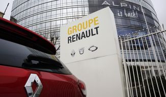 This photo taken on Thursday, Jan. 24, 2019 show a Ranult car parking outside the French carmaker headquarters in Boulogne-Billancourt, outside Paris, France. French carmaker Renault looks set to give its approval to Fiat Chrysler&#39;s merger offer. The company&#39;s board is meeting Tuesday afternoon at its headquarters to decide on a deal that could reshape the global auto industry. (AP Photo/Christophe Ena)