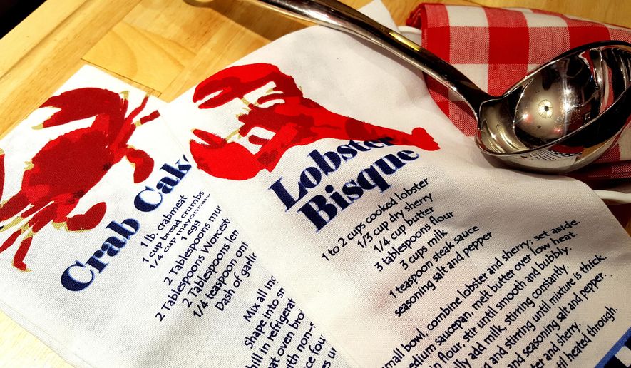 This undated photo provided by Laura Hill shows a dish towel design available on her website, www.aloveofdishtowels.com, and located in Sheffield Village, Ohio. Tea towels are a wonderful way to brighten a kitchen or let someone know you are thinking about them, says Cynthia Simmons, a category manager with Houzz.com, a popular online source of interior design photos and decorating ideas. (Laura Hill via AP)