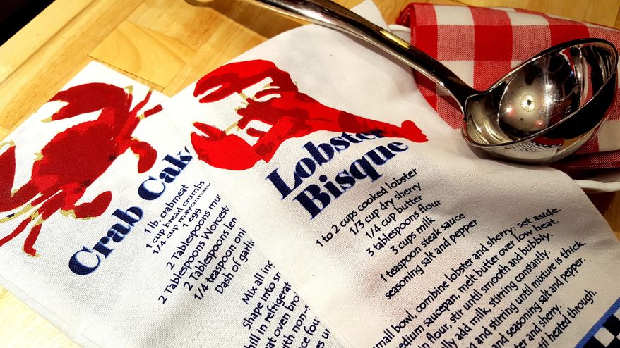 This undated photo provided by Laura Hill shows a dish towel design available on her website, www.aloveofdishtowels.com, and located in Sheffield Village, Ohio. Tea towels are a wonderful way to brighten a kitchen or let someone know you are thinking about them, says Cynthia Simmons, a category manager with Houzz.com, a popular online source of interior design photos and decorating ideas. (Laura Hill via AP)