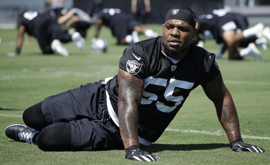 Oakland Raiders' Vontaze Burfict stretches during NFL football practice on Tuesday, June 4, 2019, at the team's training facility in Alameda, Calif. (AP Photo/Ben Margot)