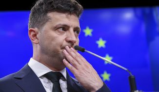 Ukrainian President Volodymyr Zelenskiy speaks during a media conference after a meeting with European Council President Donald Tusk at the Europa building in Brussels, Wednesday, June 5, 2019. (AP Photo/Riccardo Pareggiani)