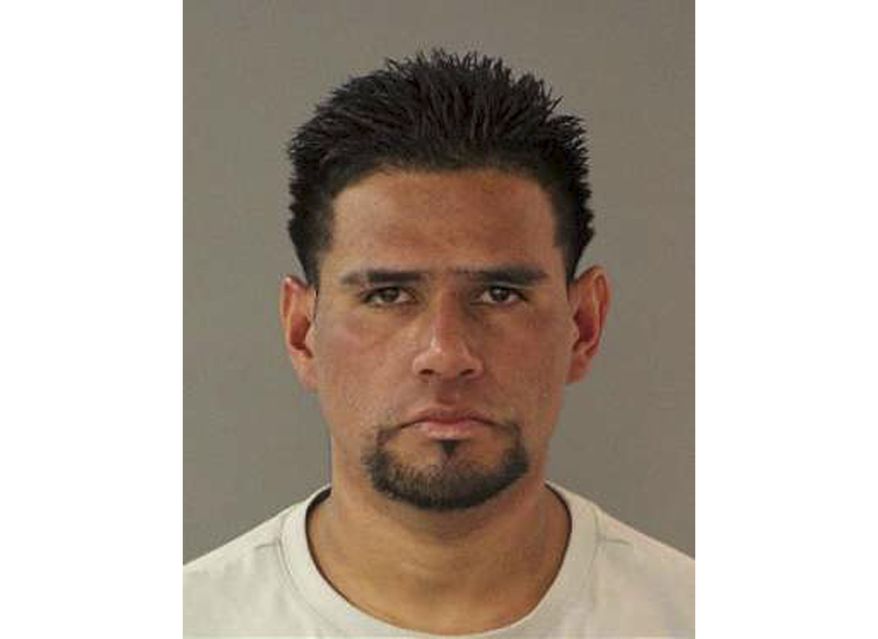FILE - This March 12, 2019 file photo provided by the San Jose Police Department shows Carlos Eduardo Arevalo Carranza. Supervisors in a Northern California county have refused to change a sanctuary policy that critics say allowed officials to release a gang member in the country illegally before he allegedly killed a woman. The Santa Clara County Board of Supervisors voted 5-0 Tuesday, June 4, 2019, to uphold their policy of not holding immigration suspects for ICE without a warrant or a judicial order unless the person is currently charged with a crime. The county's sanctuary policy came under criticism after the Feb. 28 slaying of San Jose resident Bambi Larson, 54. Police arrested Carlos Eduardo Arevalo Carranza, 24, an immigrant from El Salvador who had been on the radar of Immigration and Customs Enforcement since 2013, when he failed to show up in immigration court. (San Jose Police Department via AP, File)